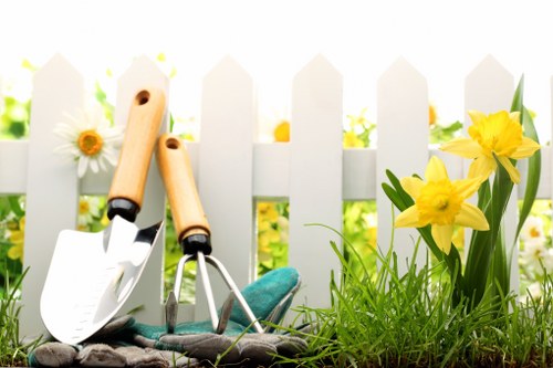 Professional landscaper working on garden maintenance in Golders Green